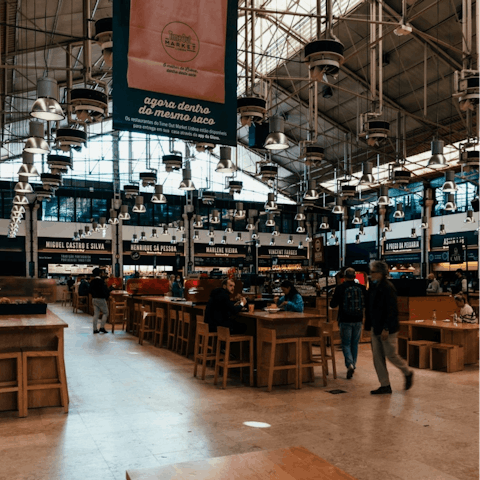 Sample all the local dishes at Time Out Market, just a thirty minute walk away