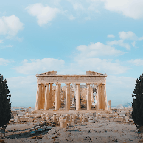 Visit the iconic Acropolis of Athens with its historic statues and artifacts