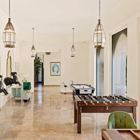 Get competitive or unwind in the well-equipped games room