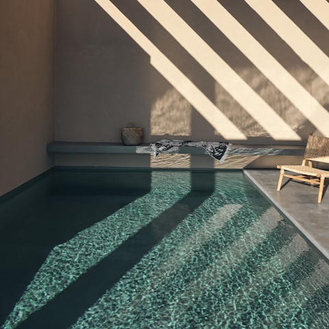 Take a refreshing dip in the sparkling swimming pool
