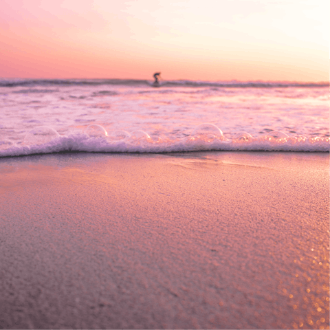 Hit the waves at the beautiful Batu Bolong Beach