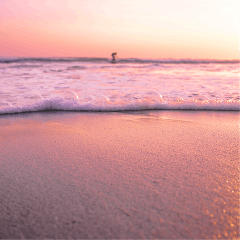 Hit the waves at the beautiful Batu Bolong Beach