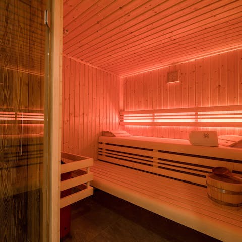 Relax your muscles in the shared sauna, glass of bubbly in hand