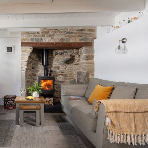 Light the wood burning stove and enjoy cuddling up on the sofa