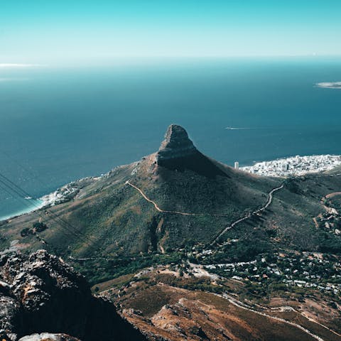 Embark on the hike up the iconic Lion's Head for breathtaking views across the Cape