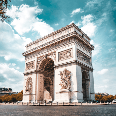 Start your day at the Arc de Triomphe, a short walk away