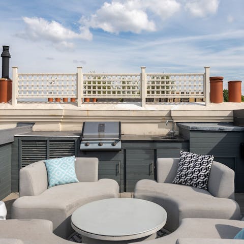 Relax on the roof terrace with a glass of wine