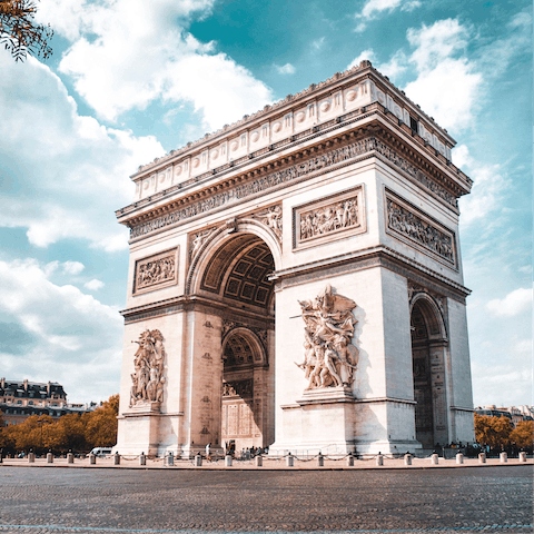 Explore Champs-Élysées and the Arc de Triomphe, under a twenty minute walk from the apartment