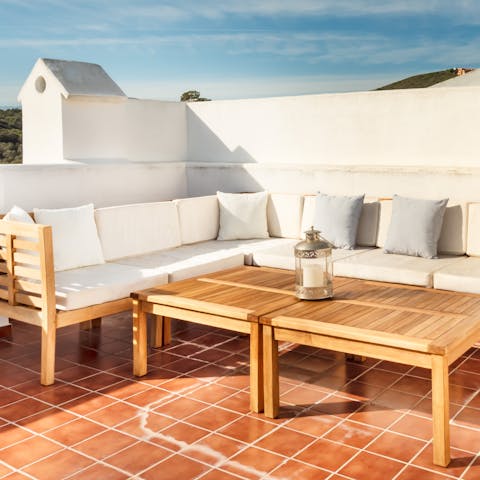 Sip a sundowner on one of the sun-trap tiled terraces