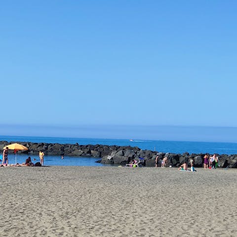 Stroll ten minutes to Fiumicino's sandy beach for a day by the sea