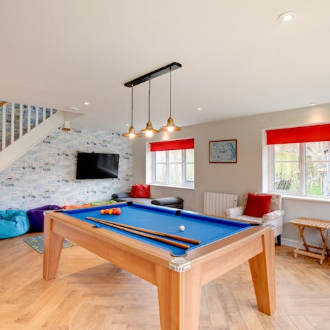 Play countless games of pool in the games room