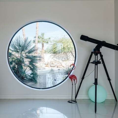 Use the telescope to see the starry night sky