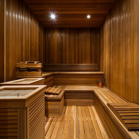 Sit back and unwind in the large private sauna