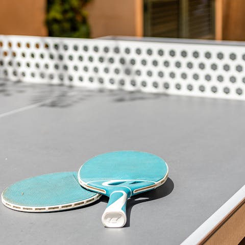 Jump into a few rounds of ping pong