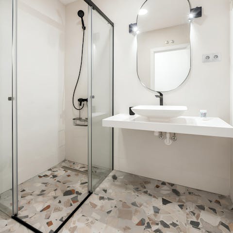 Get ready in the modern bathroom for an evening out in vibrant Madrid