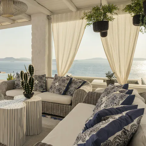 Sip cocktails on the beach-club-style terrace