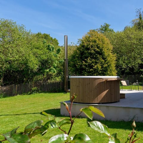 Relax in the wood-fired Swedish hot tub