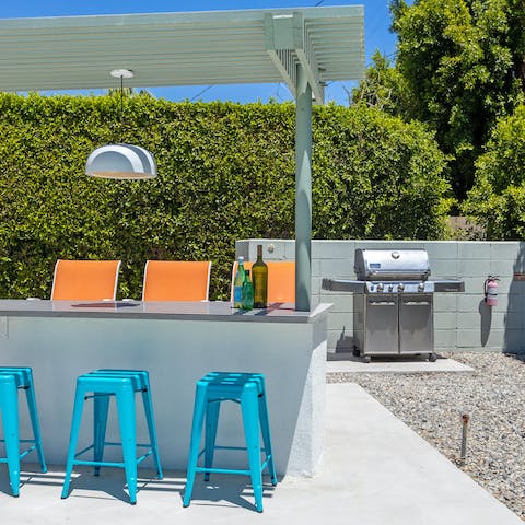 Fire up the barbecue and serve up smoky flavours on the covered table