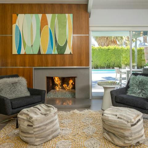 Turn on the fireplace and enjoy a nightcap in the stylish interior