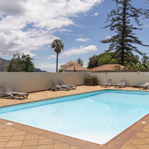 Cool off from the Madeiran sun in the communal pool