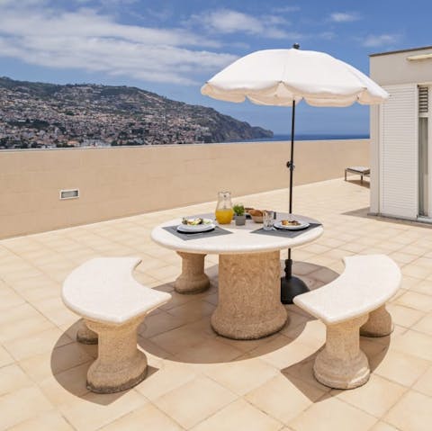 Have lunch on the terrace while taking in the city and seascape