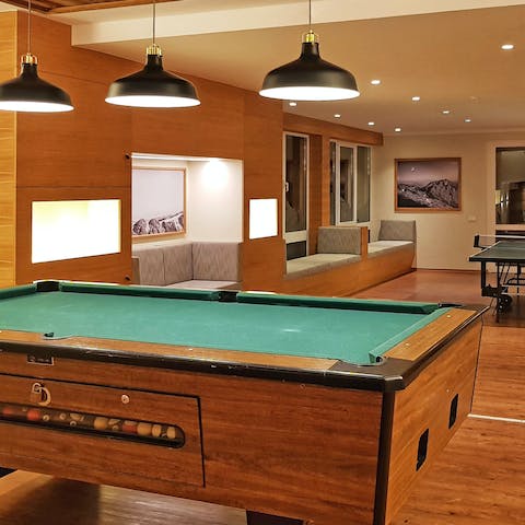 Challenge your loved ones in the communal games room