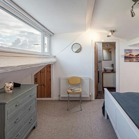 Look out to views of Snowdonia from the master bedroom's wide window