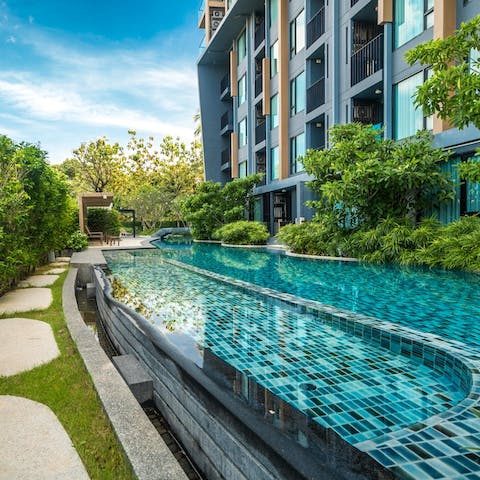 While away lazy days in one of the complex's three swimming pool, all equally lush