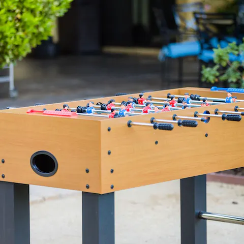 Heat up the competition with a game of table football