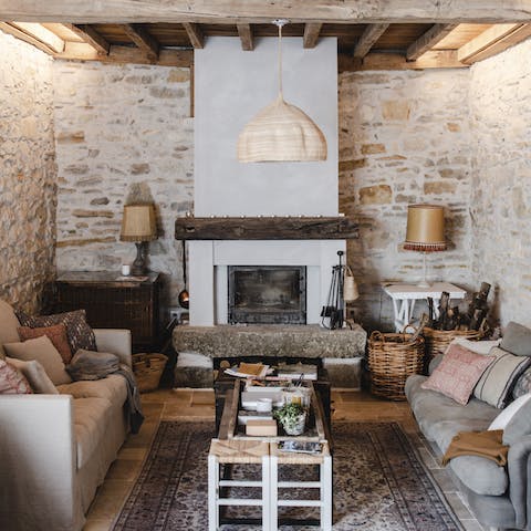 Gather by the cosy fireplace with a good book or some evening drinks