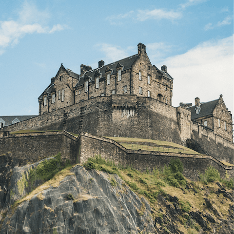 Take a fourteen-minute walk through town to visit Edinburgh Castle on its craggy seat