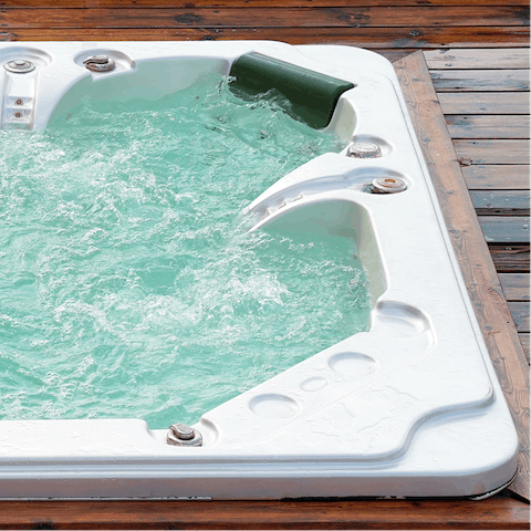 Take an evening soak in the hot tub