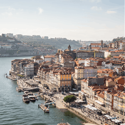 Dine out in lively Cais da Ribeira, only a thirty-six-minute metro ride away  