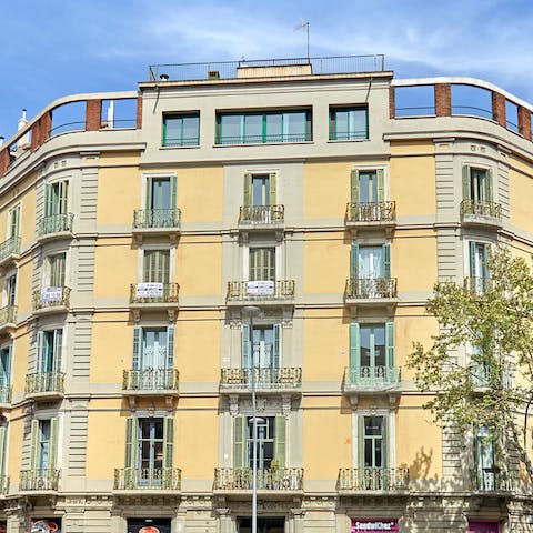 Soak up the historic grandeur of the apartment building's art nouveau facade