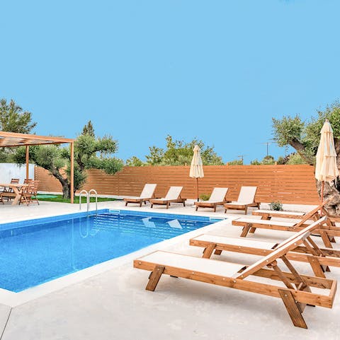 Spend afternoons flitting between the swimming pool and the loungers