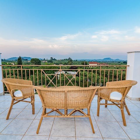 Gaze out over some glorious views of the island's countryside from the balcony