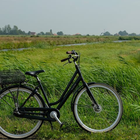 Borrow a bike from the on-site cycle rental and explore your idyllic surroundings  