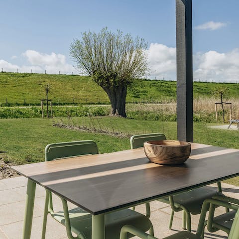 Dine alfresco in the fresh air and watch the sunset – we suggest rustling up stamppot 