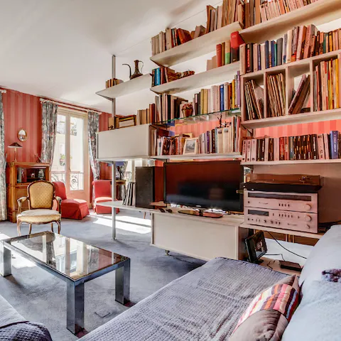 Kick back in the comfortable living area with a book from the shelves while listening to a record
