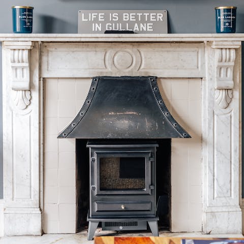 Cosy up around the fireplace after a day of splashing around at the beach