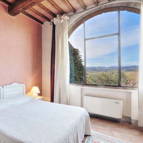 Wake up to views of the Tuscan countryside