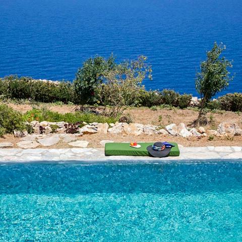 Paddle about in the villa's swimming pool and admire the Aegean panorama