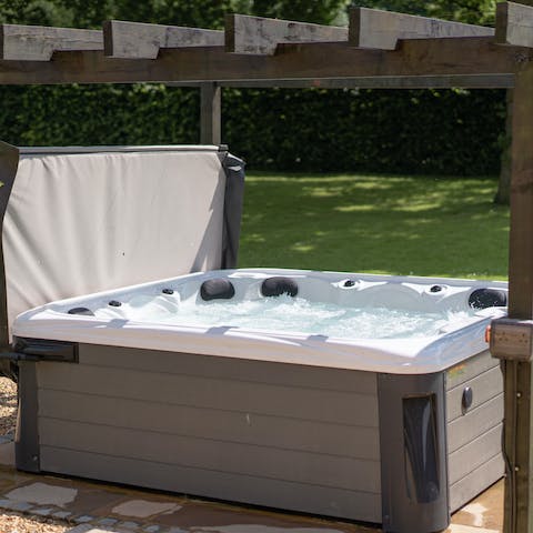 Unwind with a sundown session in the private hot tub