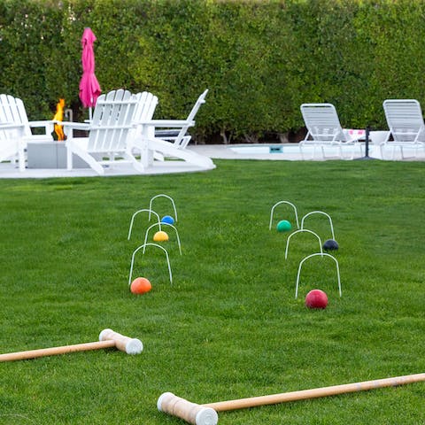 Let your competitive side out playing croquet, bocce ball and corn hole