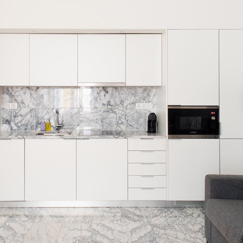 Plate up home-cooking perfection in the marble-clad kitchen 