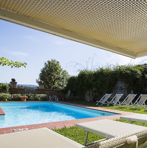 Enjoy the tranquillity of the garden whilst lounging by the pool