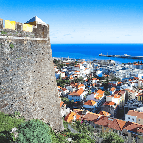 Take a sunny stroll down to Funchal Bay for a day out and dine by the coast