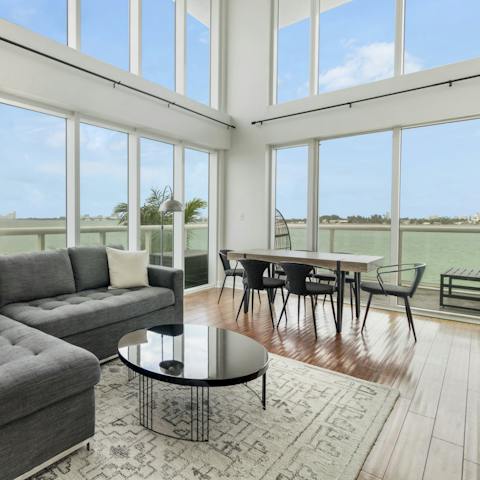 Take in stunning views of Biscayne Bay from the bright living room