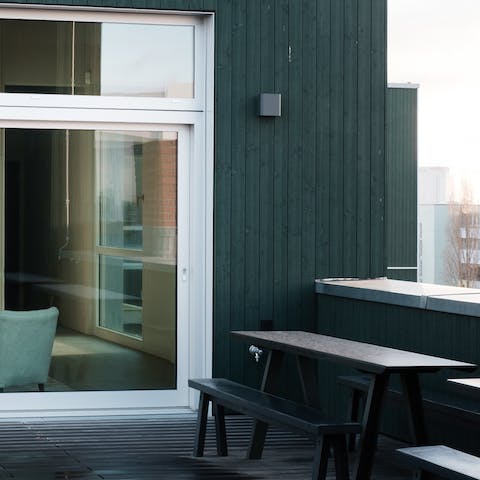 Sit out on the home's huge roof terrace and look out over the Berlin skyline
