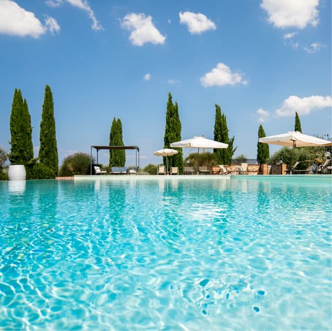 Relax on a lounger in the Italian sun by your private pool